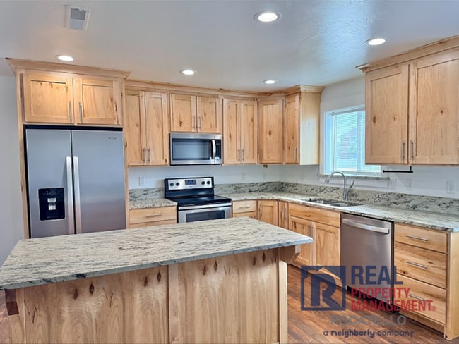 Foto del edificio - 3 bed 2.5 bath twinhome - 1 car garage