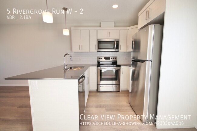 Photo du bâtiment - Beautiful 4 bedroom, 2.5 bathrooms condo i...