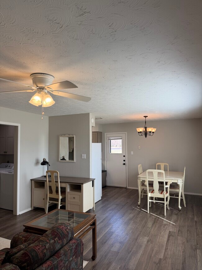 workspace, dining room, and side door to patio - 2604 N Austin Ave