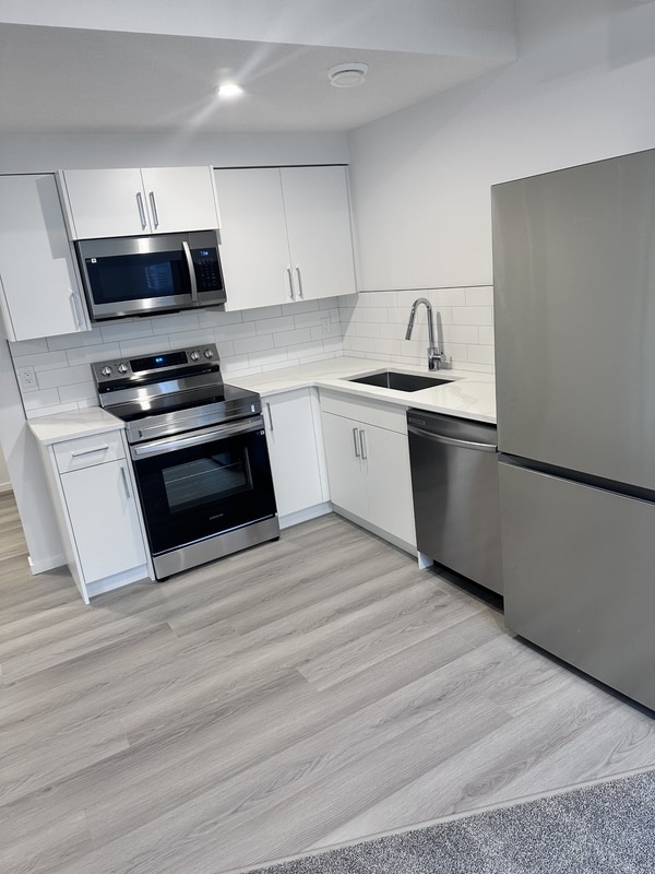 Building Photo - 7737-174A 174A Ave NW