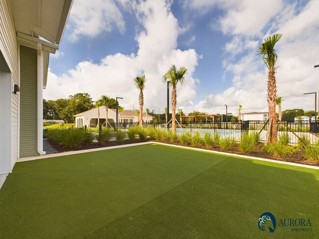 Outdoor Yoga Lawn - Aurora St. Leon Apartments