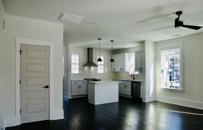 Up the stairs you walk to this enormous living room and kitchen - 1013 Parkwood Ave