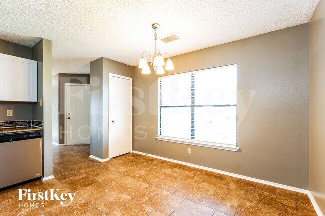 Building Photo - 6907 Saharastone Dr