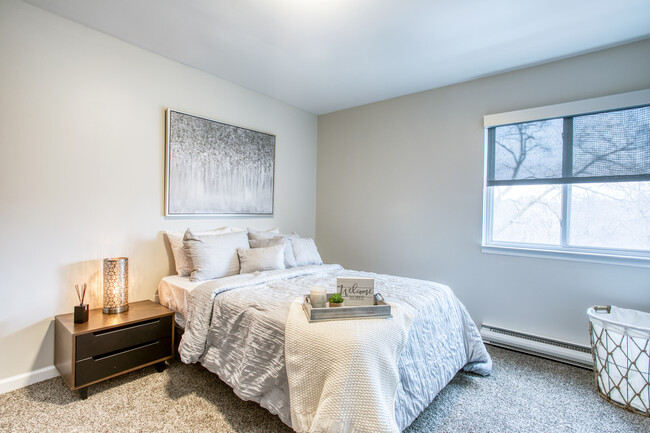 Renovated Bedroom - College Hill Apartments