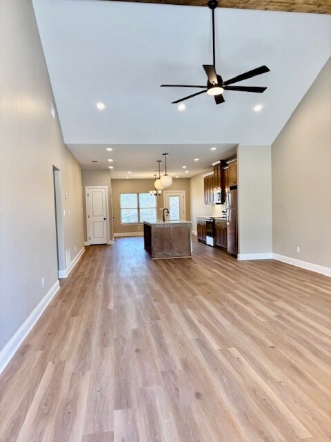 open floorplan living, kitchen & dining - 225 S Pine St