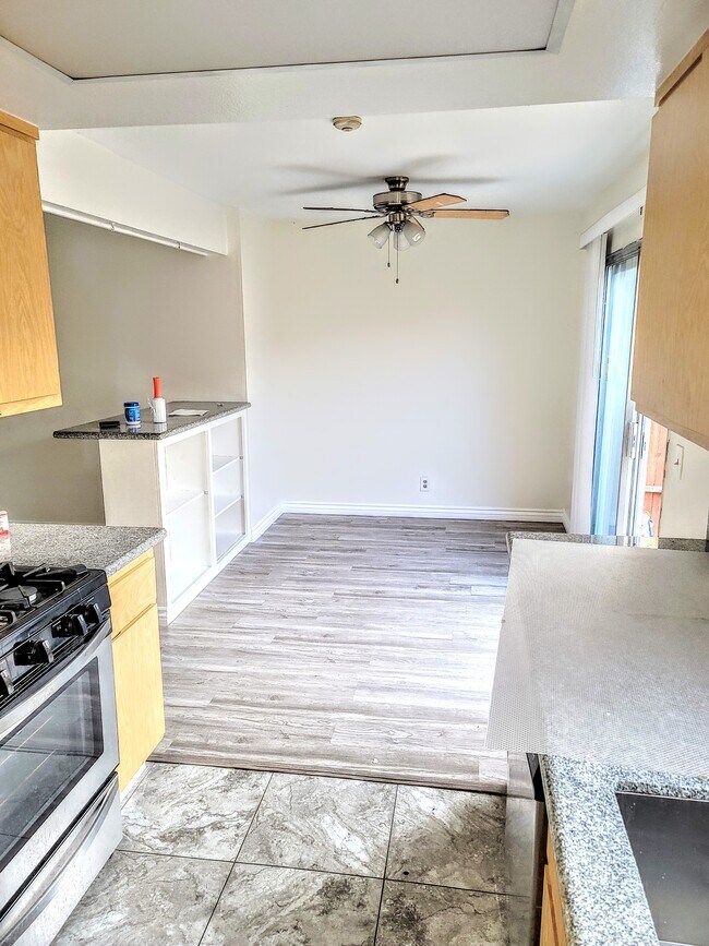 Dining area & patio doors - 2306 Curtis Ave