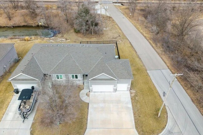 Building Photo - Waterfront Home in Buccaneer Bay with 3-Car Garage & Walkout Basement