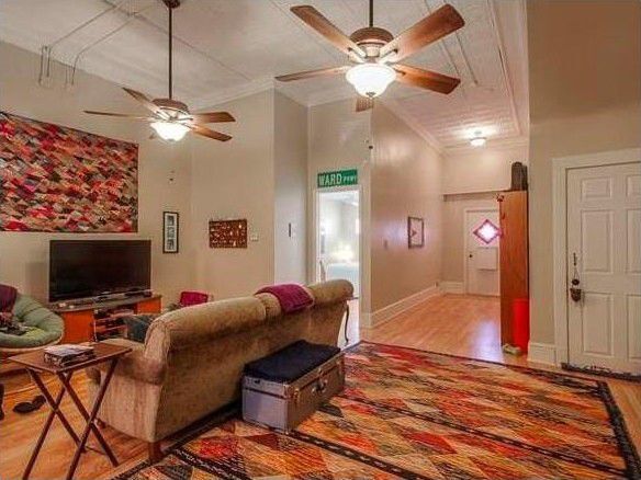 Living room with high ceilings. - 1137 W 41st St