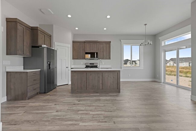 Foto del edificio - NEW HOME with large garage stalls and unfinished basement for additional storage