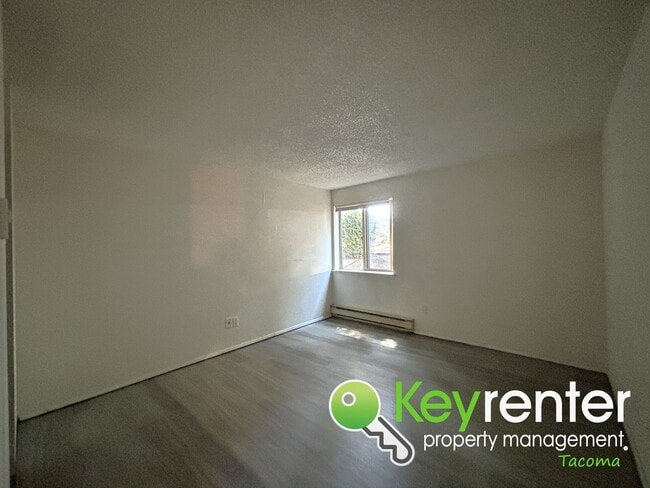 Building Photo - Peaceful Lakewood Condo Backed up to Chamb...