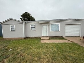 Building Photo - 3818 NE 26th Ave