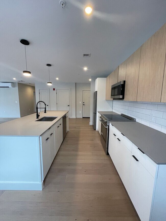 Foto del edificio - New construction condo available now!
