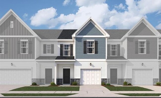 Building Photo - SPECIAL PRICING NOW! NEW TOWNHOMES ACROSS ...