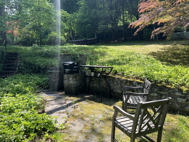 Outdoor fireplace and patio - 360 S State Rd