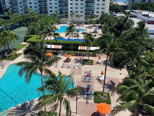 Building Photo - 19380 Collins Ave