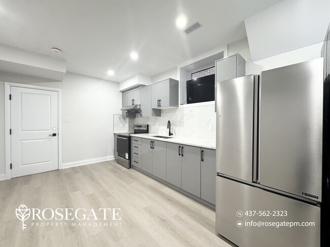 Building Photo - Bright 2-Bedroom Basement Apartment with P...