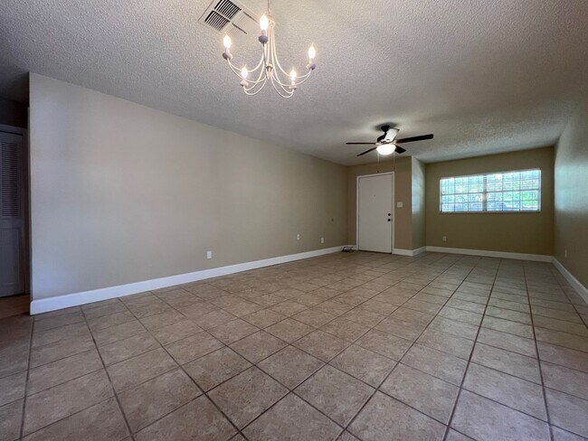 Building Photo - Newly Renovated 3/2 Home ~ Brand New Kitchen ~ Updated Bathrooms ~ Fenced Yard!