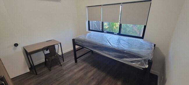 Building Photo - Beds Available Newly Renovated Building , ...