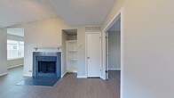 This 560 square foot apartment in Carrollton, TX, offers a thoughtful layout maximizing space and functionality. The single-story unit features two bedrooms, including a spacious primary bedroom of 340 square feet, and one full bathroom. The open-plan design creates a sense of flow between living areas, enhancing the perception of space.

Throughout the apartment, modern finishes are evident, with light-toned wood-look flooring providing a cohesive and contemporary aesthetic. The bathroom showcases clean, white tile work and a combined tub and shower unit, emphasizing efficiency in the compact space.

Large windows in the bedrooms allow ample natural light, creating bright and inviting spaces. Ceiling fans are installed for improved air circulation and comfort. The neutral color palette of the walls provides a versatile backdrop for personal decor choices.

The kitchen area, while not explicitly shown, likely integrates seamlessly with the main living space, adhering to the open-concept design. A closet is mentioned, offering valuable storage solutions within the limited square footage.

Overall, this apartment presents a well-designed living space that balances comfort and functionality, ideal for those seeking a cozy yet modern urban dwelling in Carrollton.
