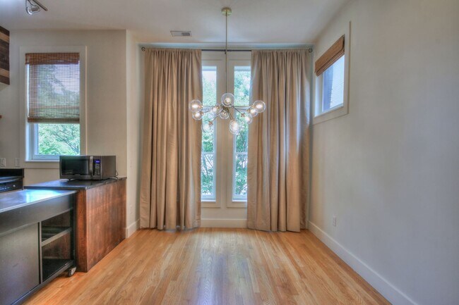 Building Photo - Price Improvement! Condo in the heart of 1...