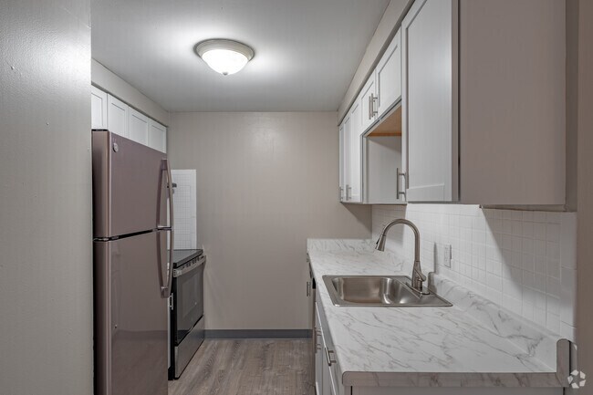 2 habitaciones, 1 baño - 835 pies cuadrados - Cocina - Creekside Village Apartments