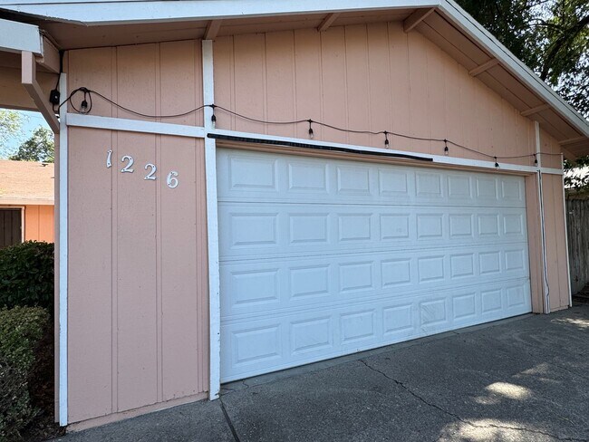 Building Photo - Three Bed, Two Bath Duplex With Two Car Ga...