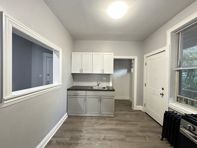 Foto del edificio - 1214 W Rosemont Ave