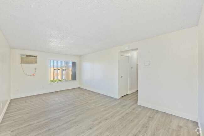 3BR, 2BA - 1,100SF - Living Room - Springbrook Park Apartments