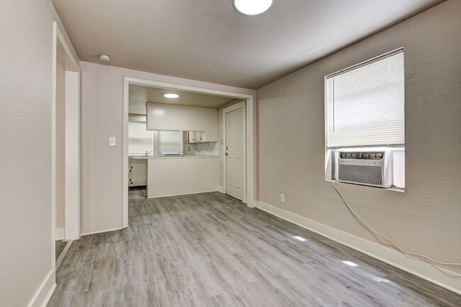 Building Photo - Charming Home Near Midtown: Wood Flooring ...