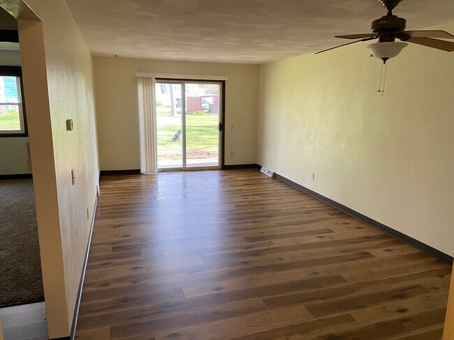 New flooring in living/dining area with walk-out patio - 637 Fairmont Ave
