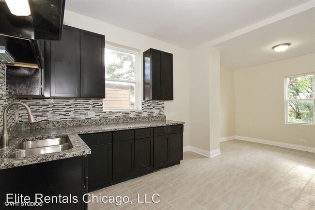 Building Photo - 4 br, 1 bath Apartment - 7836 S. Peoria St.