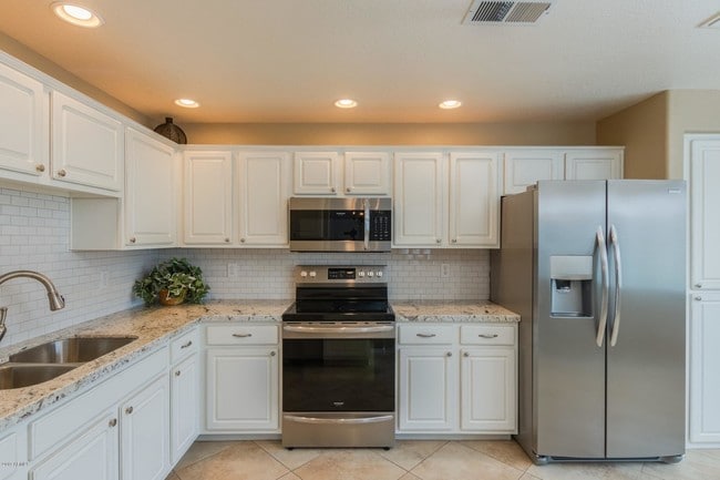 Building Photo - 9555 E Raintree Dr