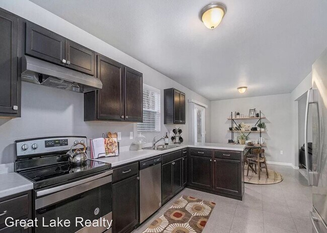 Foto del edificio - 4 br, 2.5 bath House - 8750 Jane Ann Circle