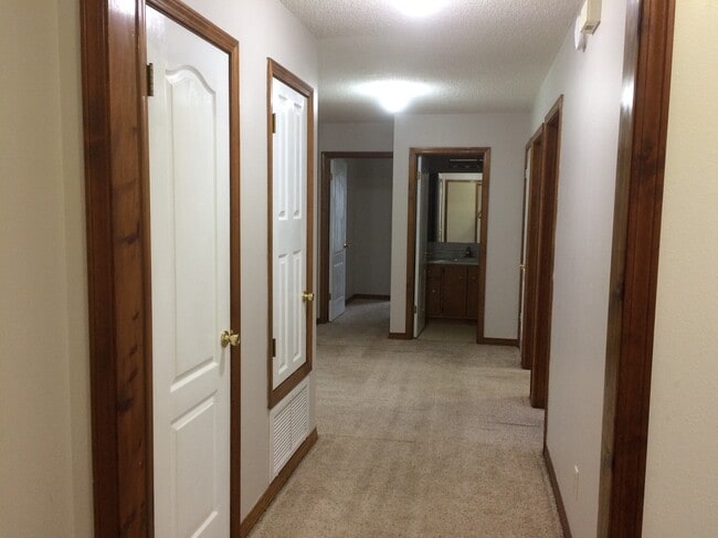 Hallway from entry to bedrooms - 6124 Arnies Way