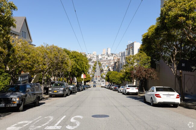 Russian Hill is visible from one of Cow Hollow's streets.
