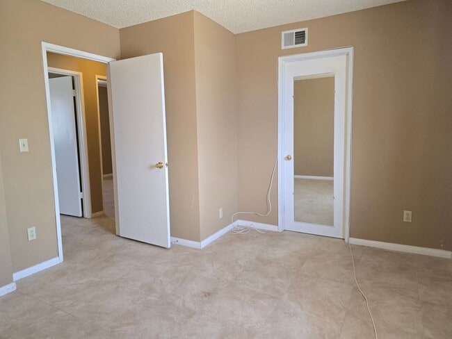 Building Photo - Coming Soon! All Tile and Brand New HVAC