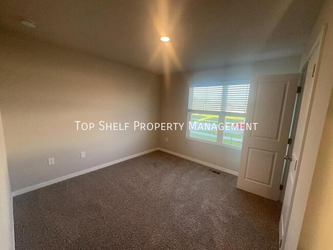 Foto del edificio - 1407 NE Crossing Oaks Dr