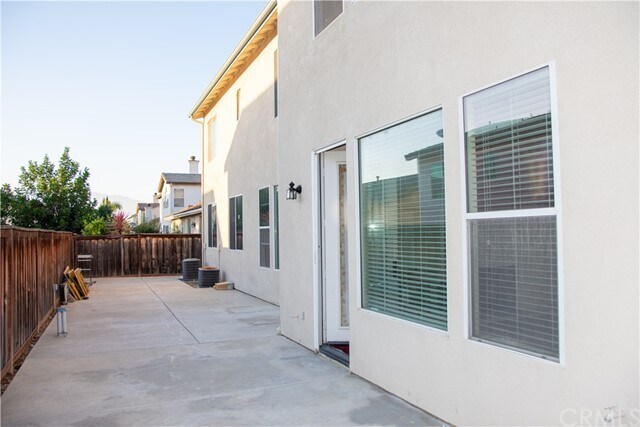 Building Photo - 7471 Wild Rose Dr