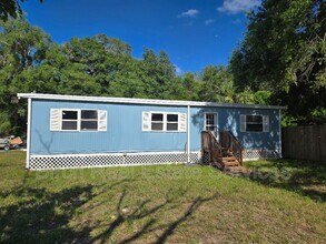Building Photo - 8628 Adonis Rd