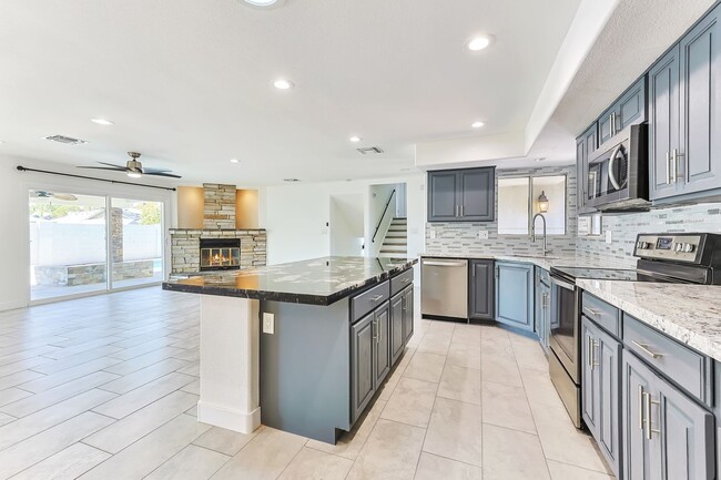 Building Photo - Massive Remodeled Tri-Level Near ASU with Diving Pool