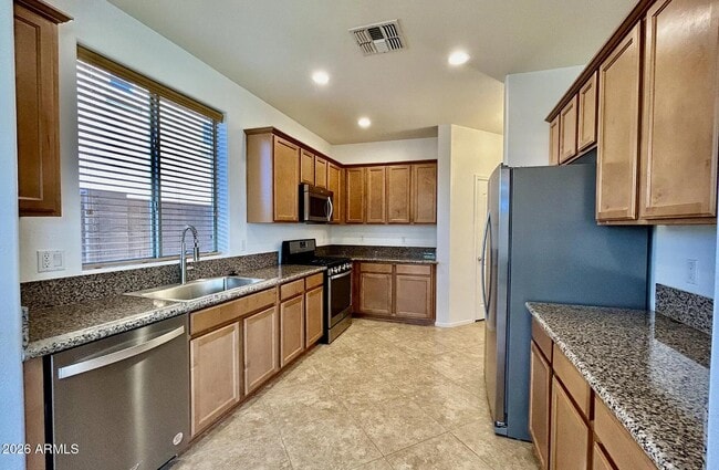 Building Photo - 3028 S 90th Dr