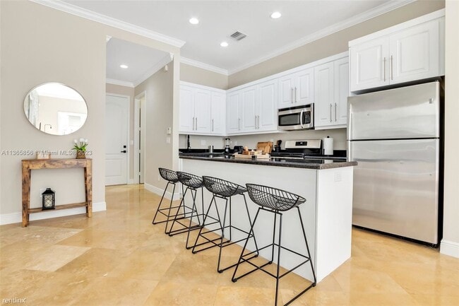 Foto del edificio - 3 br, 2.5 bath House - 1380 NE 24th St # 1380