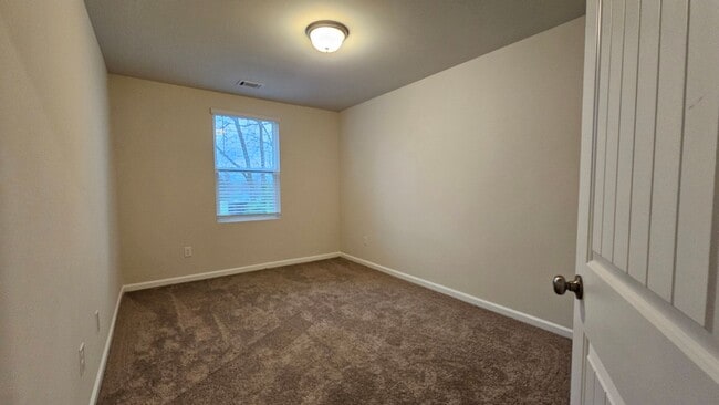 Building Photo - Like NEW townhome located in the sought af...