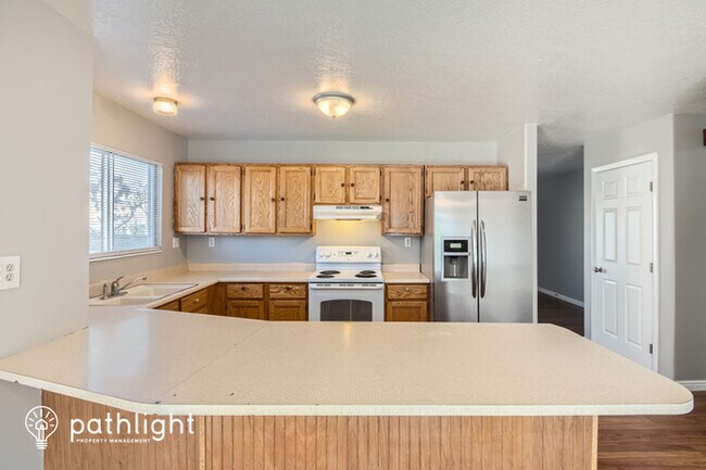 Building Photo - 6674 Roundstem Road