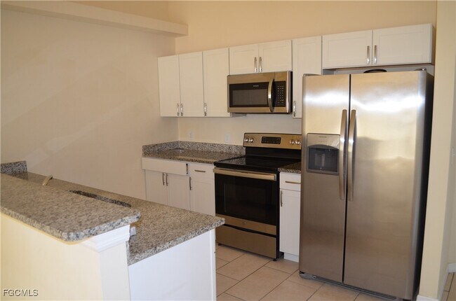 Building Photo - 1016 NE 8th Pl