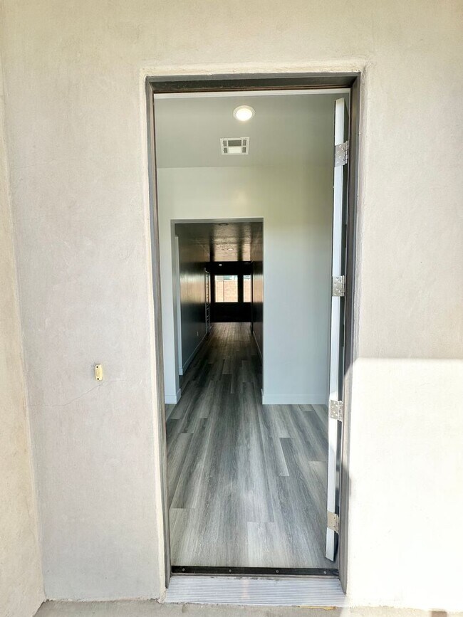 Building Photo - Desert Edge Home!  4 car garage! Price red...