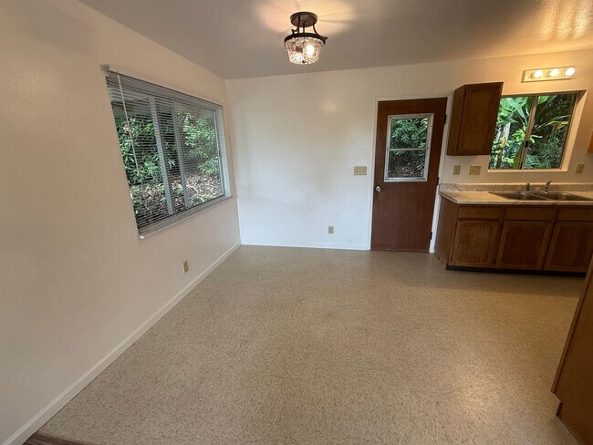 Building Photo - 3 Bedroom, 2.5 Bath House with 2-Car Carport