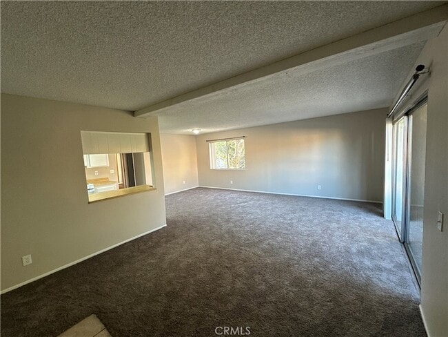 Building Photo - 16970 Marygold Avenue Unit 39