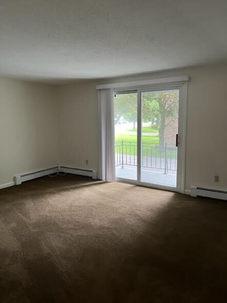 Living Room with sliding door - 1156 Orchard Park Rd