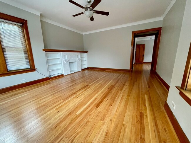 Living room connects to dining room - 5336 W Dakin St